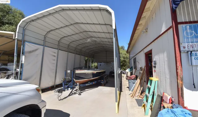a view of a yard covered with snow in the background