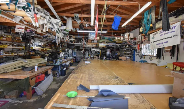 a view of wooden fence and trees