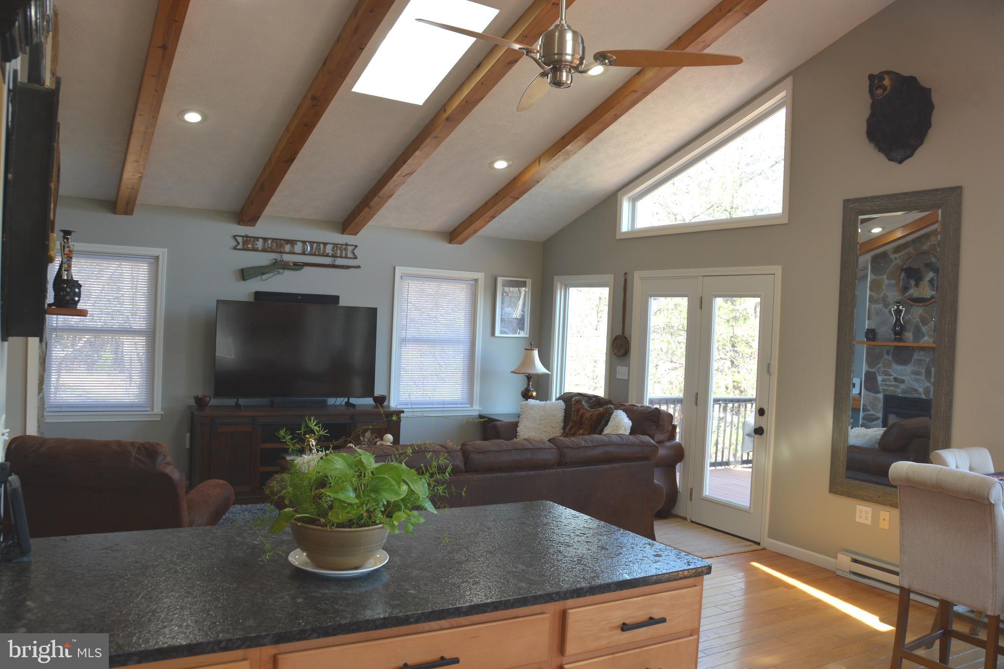 400 Locust Ridge Moorefield, WV 26836 - Photo 22 of 87 a living room with fireplace furniture and a flat screen tv