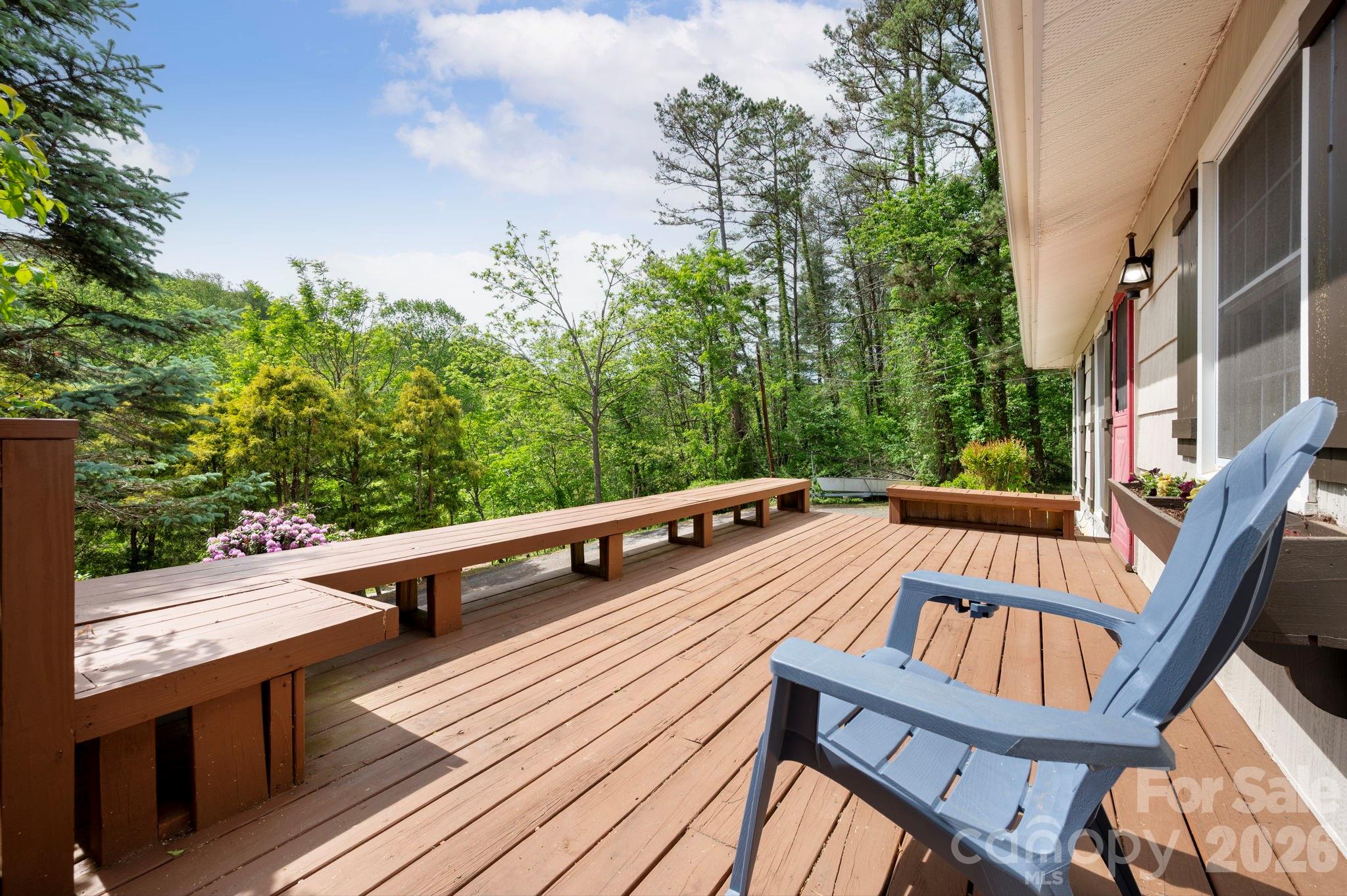 34 Wolfe Cove Road Asheville, NC 28804 - Photo 30 of 42 a view of balcony with wooden floor and outdoor seating