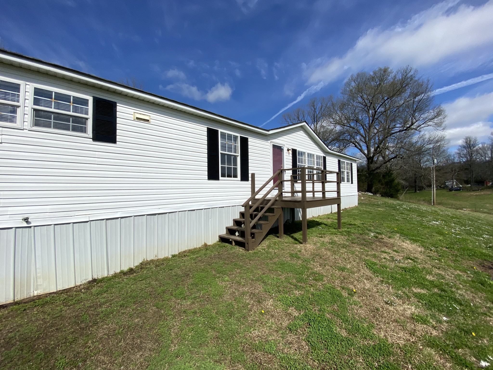 3200 Beasleys Bend Road Lebanon, TN 37087 - Photo 2 of 19 a backyard of a house with table and chairs