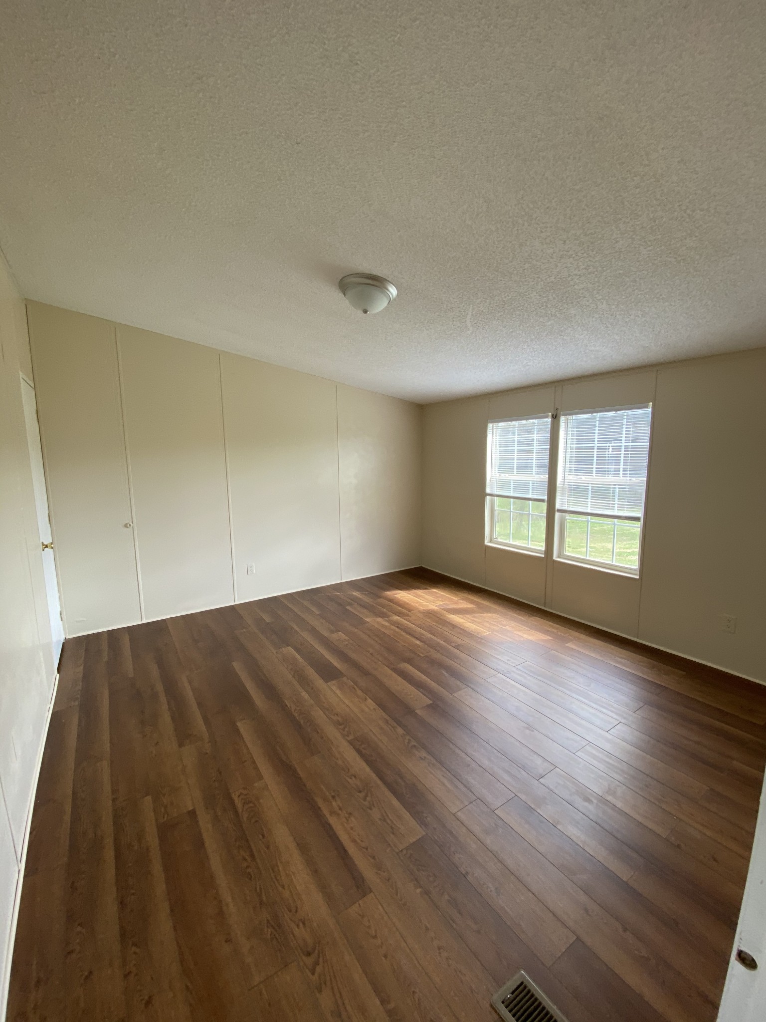 3200 Beasleys Bend Road Lebanon, TN 37087 - Photo 14 of 19 a view of empty room with wooden floor and fan