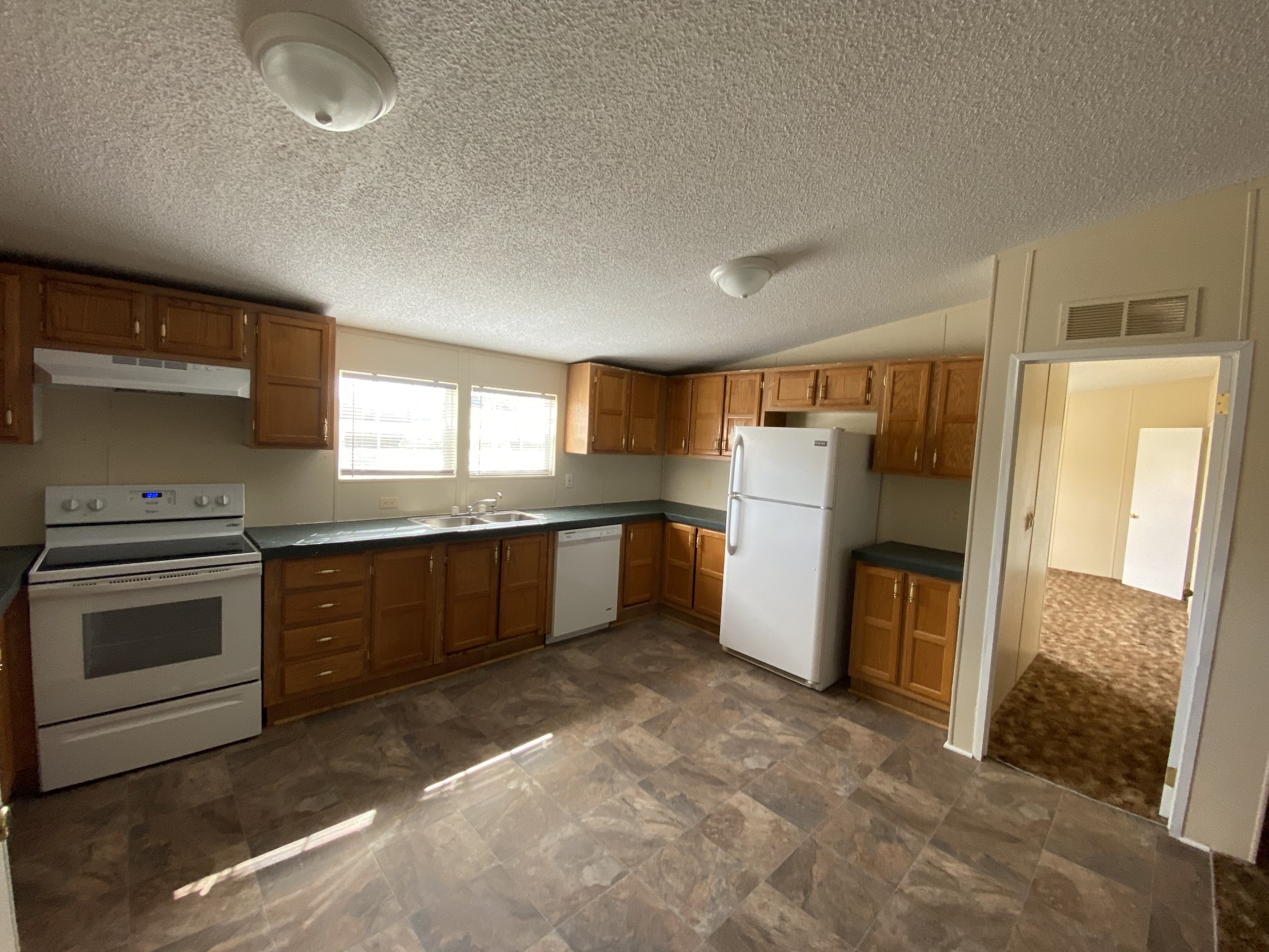 3200 Beasleys Bend Road Lebanon, TN 37087 - Photo 7 of 19 a kitchen with a refrigerator sink and stove