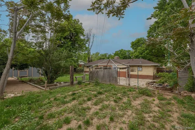 a backyard of a house with lots of green space