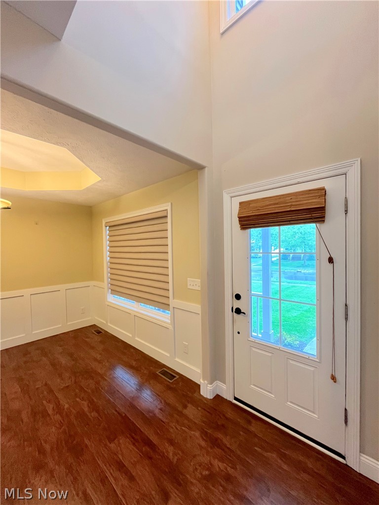 1134 Mayfield Ridge Road Cleveland, OH 44124 - Photo 4 of 41 Foyer featuring a raised ceiling and dark hardwood / wood-style flooring