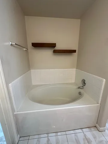 a bathroom with a bathtub