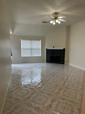 a view of a windows and chandelier in a room