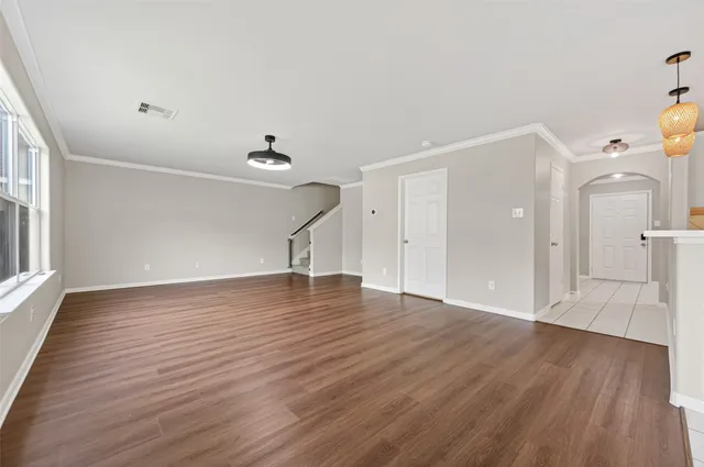 a view of a livingroom with wooden floor