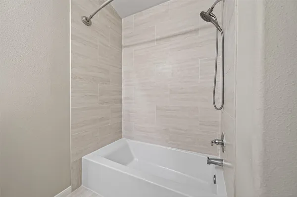 a bathroom with a bathtub