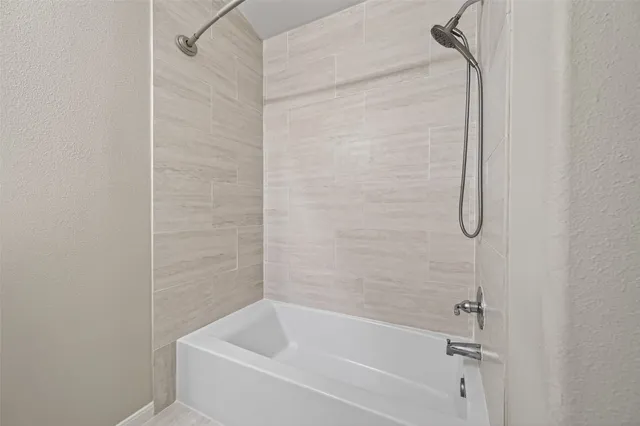 a bathroom with a bathtub