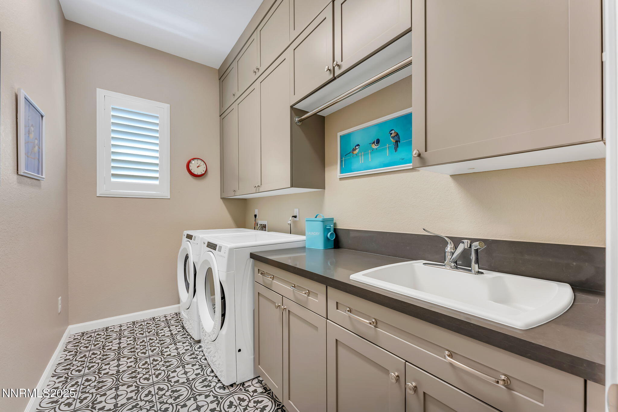 2121 Kate's Bridge Drive Reno, NV 89521 - Photo 23 of 35 a bathroom with a sink and a mirror