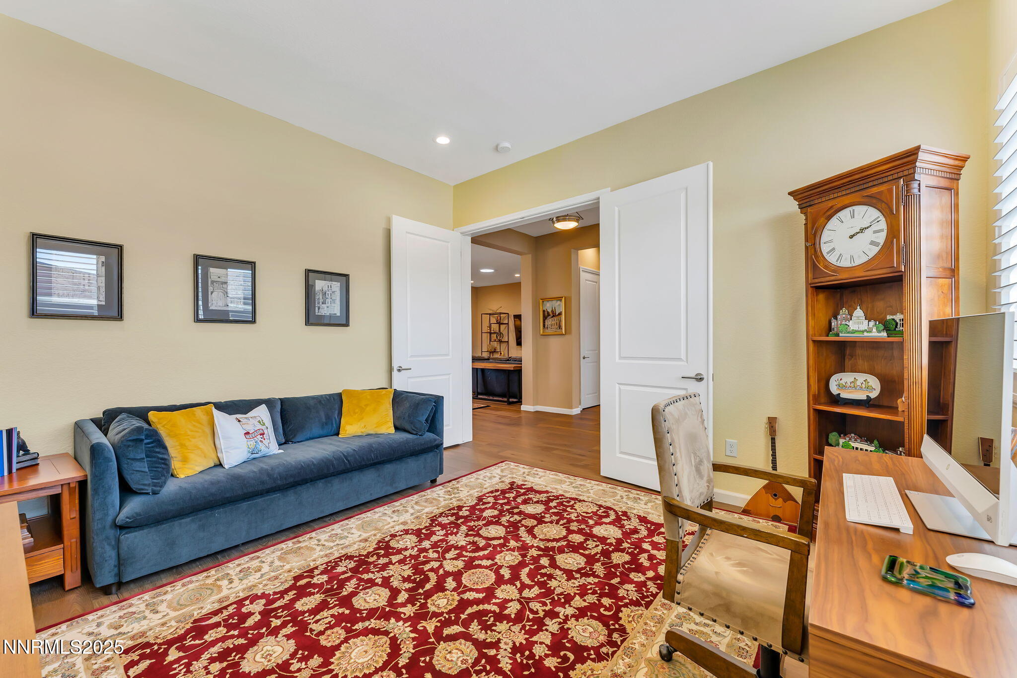 2121 Kate's Bridge Drive Reno, NV 89521 - Photo 6 of 35 a living room with furniture and a rug