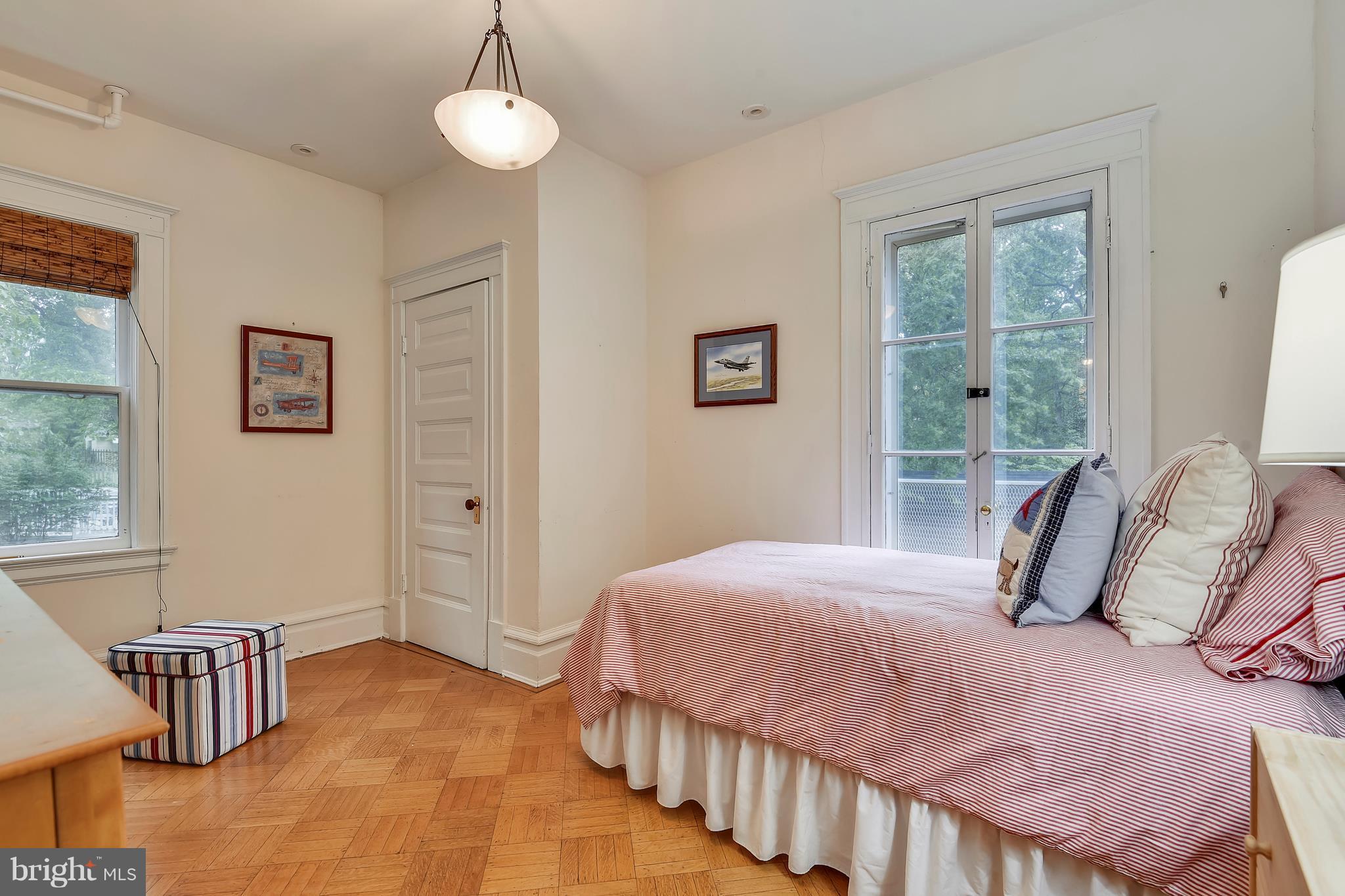 501 Hawthorn Road Baltimore, MD 21210 - Photo 17 of 30 a bedroom with a bed and a window