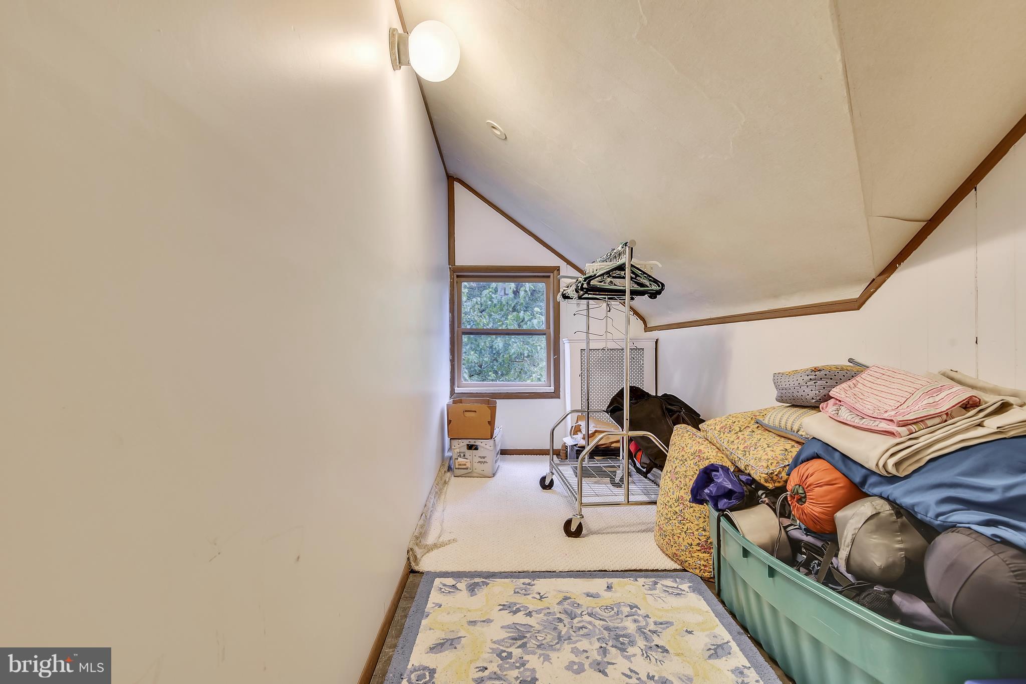 501 Hawthorn Road Baltimore, MD 21210 - Photo 22 of 30 a bed room with a bed and a window