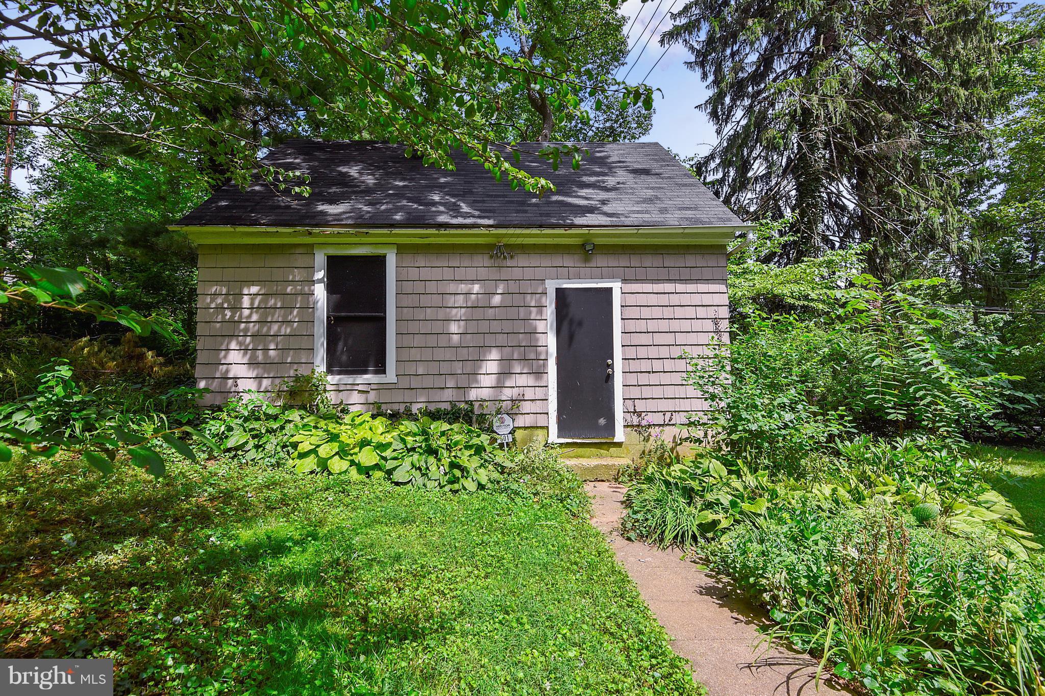 501 Hawthorn Road Baltimore, MD 21210 - Photo 26 of 30 a front view of a house with garden