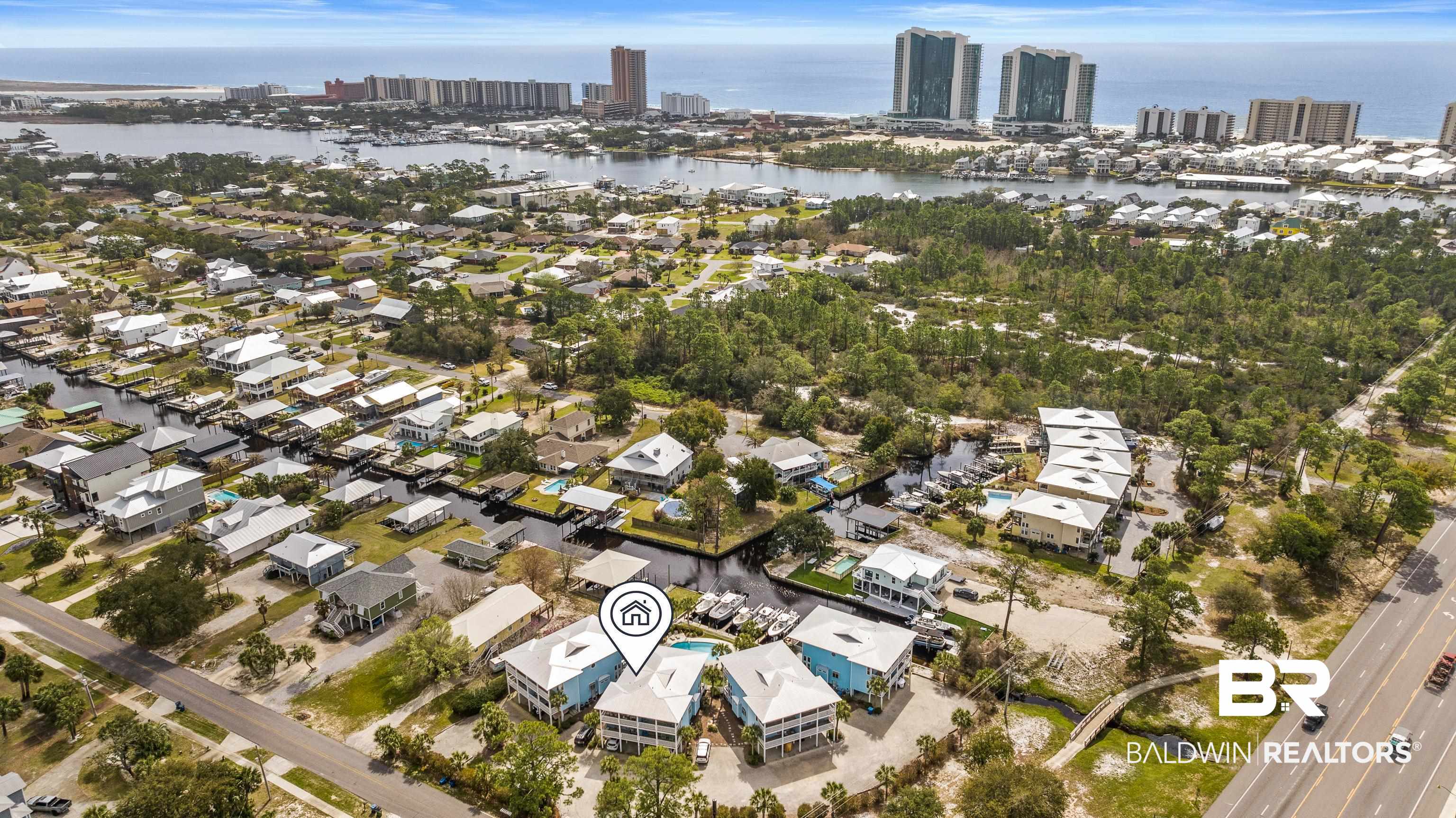 26060 Marina Road, Unit 3 Orange Beach, AL 36561 - Photo 35 of 37 Aerial overview of property's location featuring a large body of water