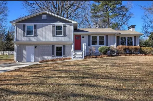 a front view of a house with a porch