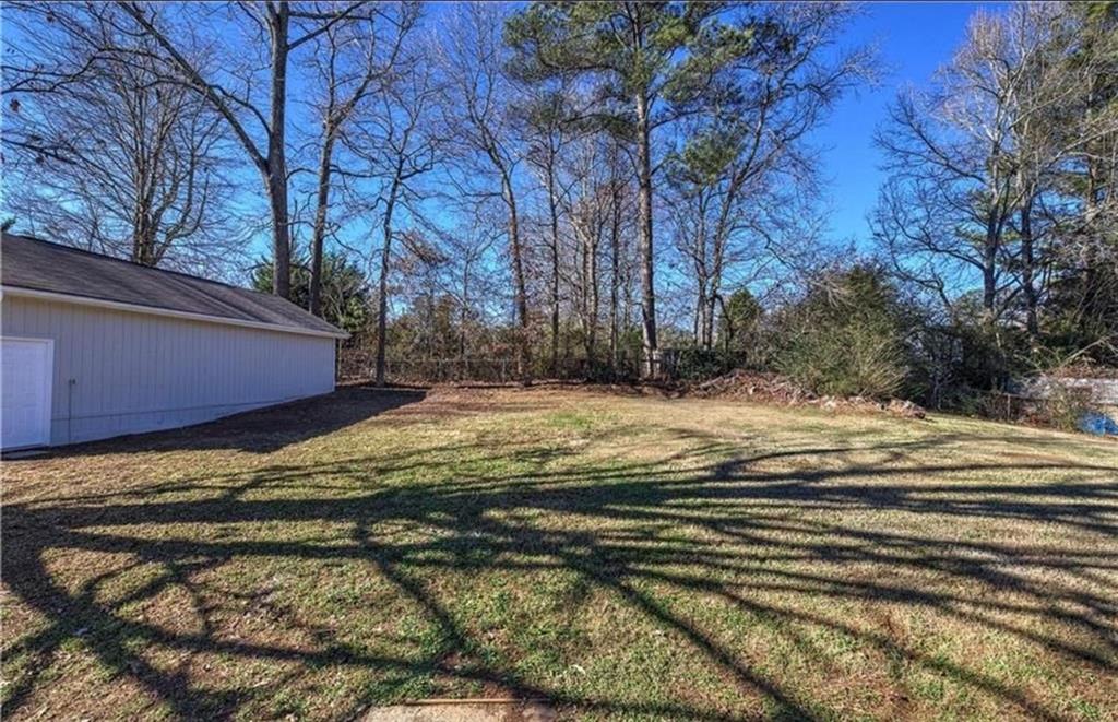 3002 Jennings Court Powder Springs, GA 30127 - Photo 11 of 47 a view of a yard with a house