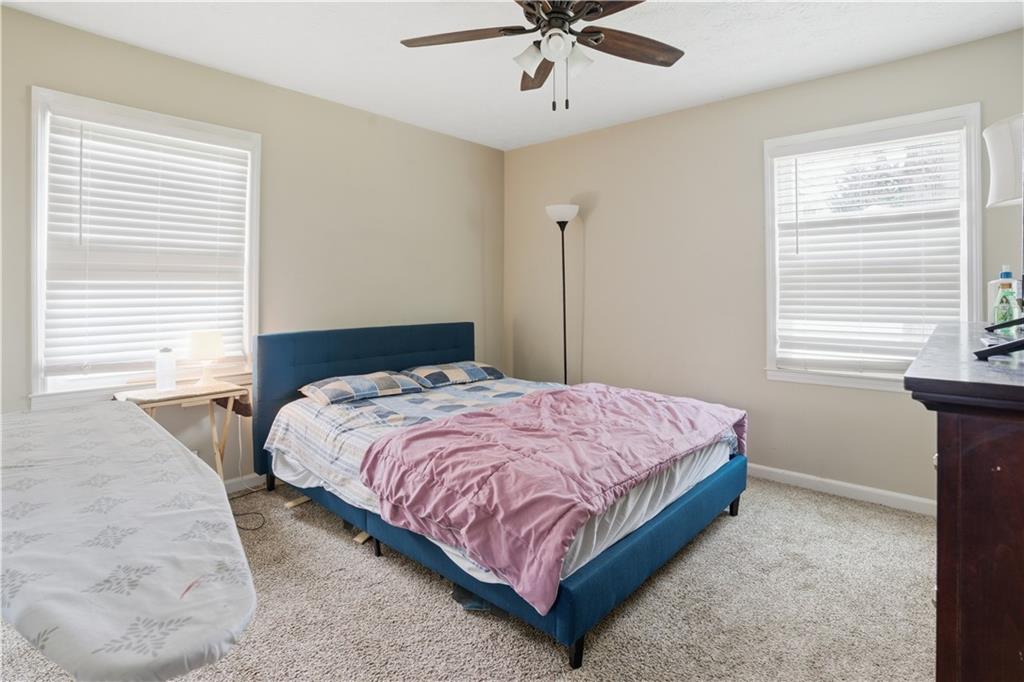 3002 Jennings Court Powder Springs, GA 30127 - Photo 29 of 47 a bedroom with a bed and window