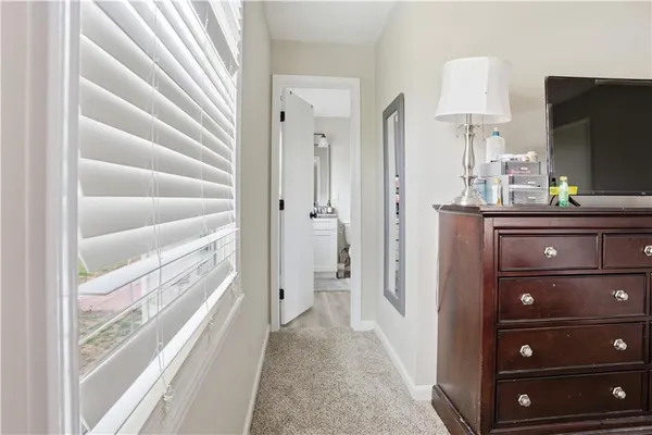 a view of room with cabinets and a couch