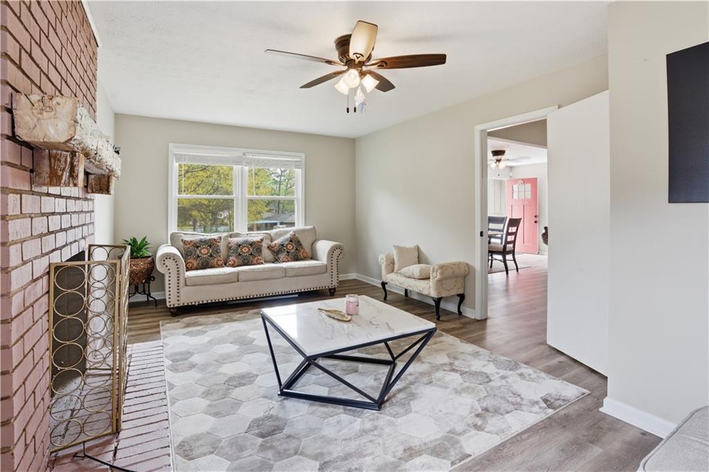 3002 Jennings Court Powder Springs, GA 30127 - Photo 34 of 47 a living room with furniture and a rug