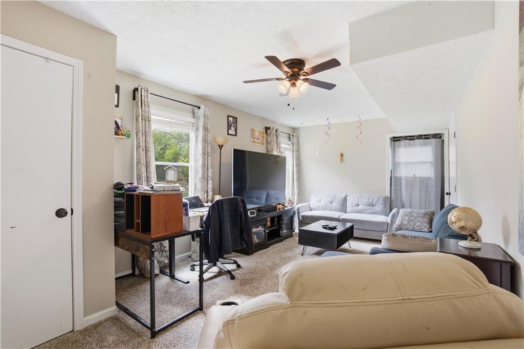 3002 Jennings Court Powder Springs, GA 30127 - Photo 42 of 47 a living room with furniture