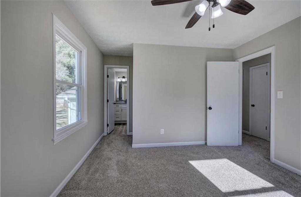 3002 Jennings Court Powder Springs, GA 30127 - Photo 7 of 47 a view of an empty room with a window