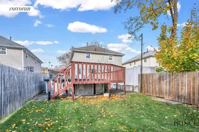 a view of a backyard with a deck