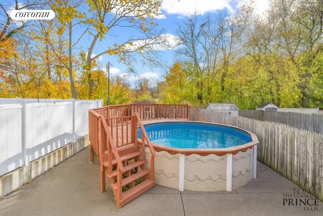 a view of a jacuzzi with outdoor seating