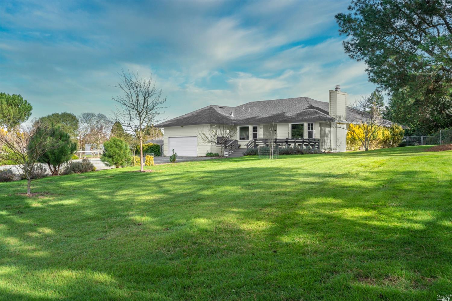 7802 Kennedy Road Sebastopol, CA 95472 - Photo 1 of 1 a front view of a house with a yard