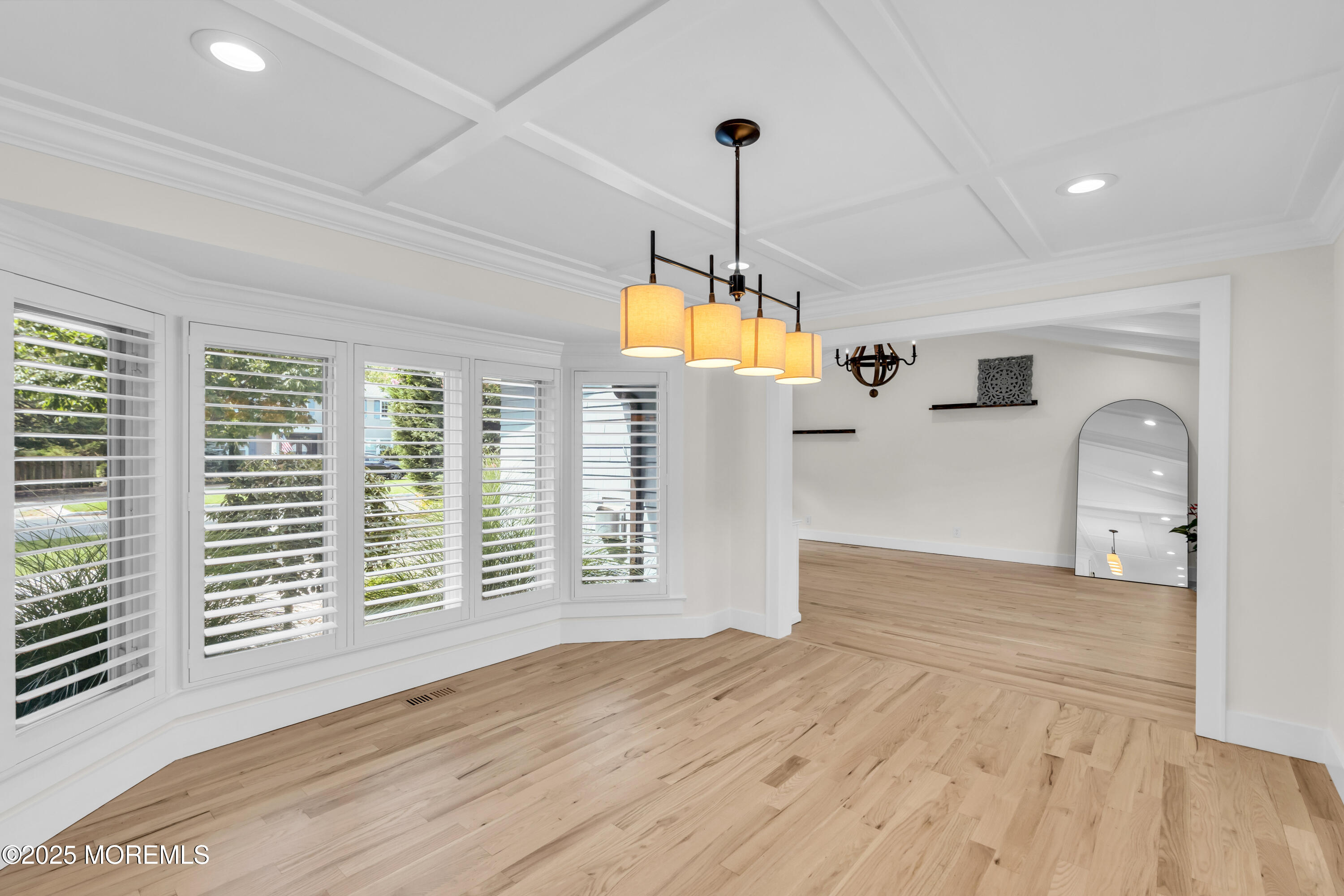 406 Brown Street Brielle, NJ 08730 - Photo 17 of 72 a view of empty room with wooden floor and fan