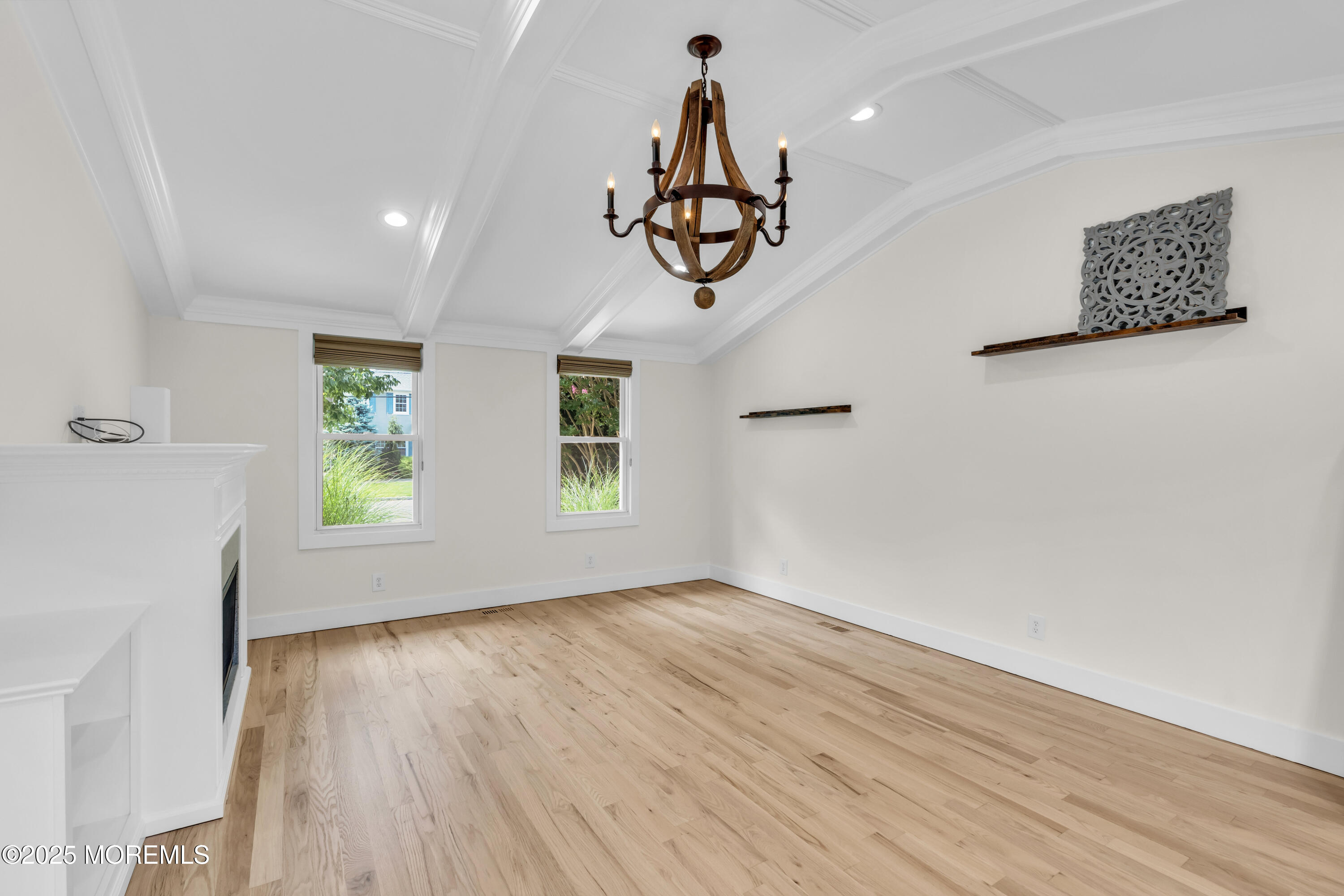 406 Brown Street Brielle, NJ 08730 - Photo 18 of 72 a view of empty room with wooden floor and window