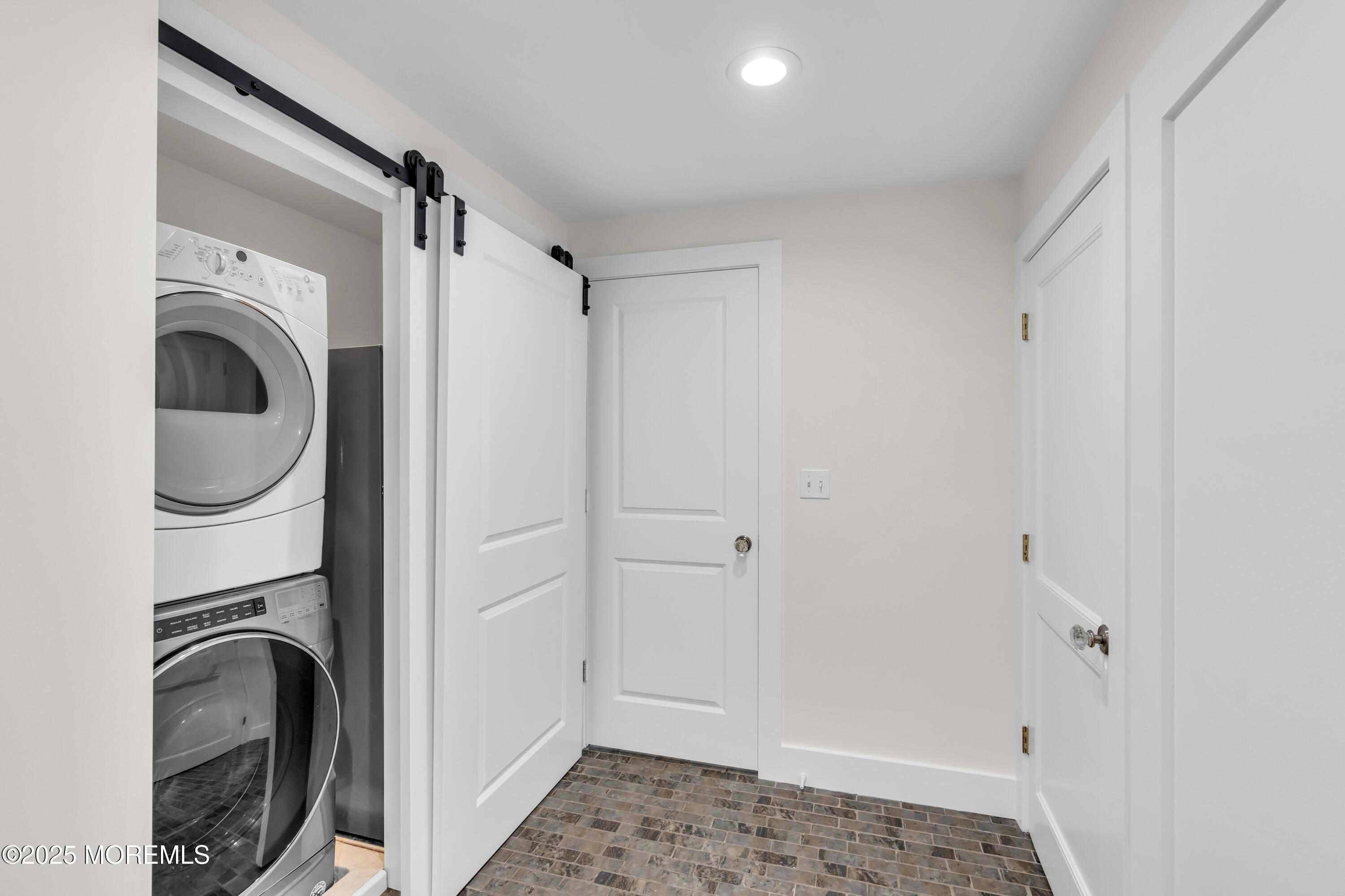 406 Brown Street Brielle, NJ 08730 - Photo 24 of 72 a view of a bathroom with a washer and dryer