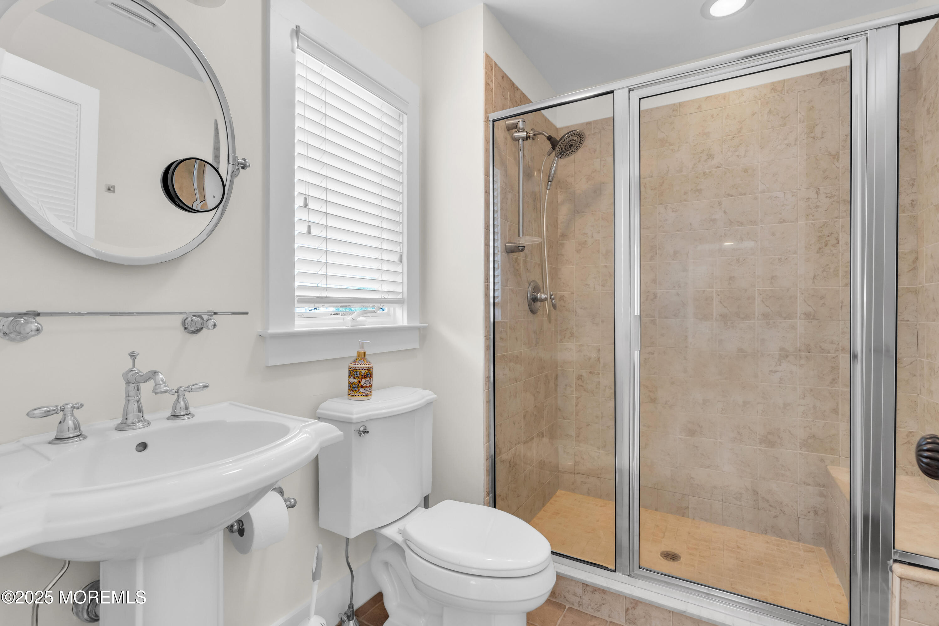 406 Brown Street Brielle, NJ 08730 - Photo 34 of 72 a bathroom with a sink a toilet and shower