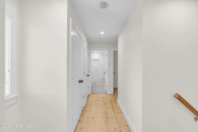 a backyard of a house with a yard and outdoor seating