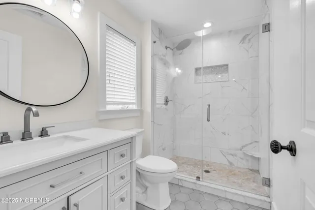 a view of a backyard with sitting area