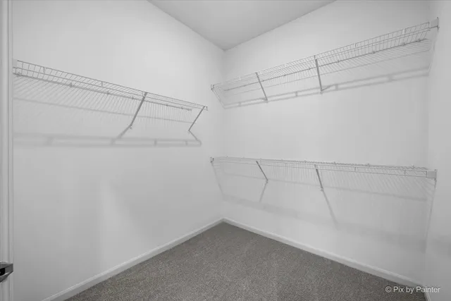 a view of a room with racks on the wall