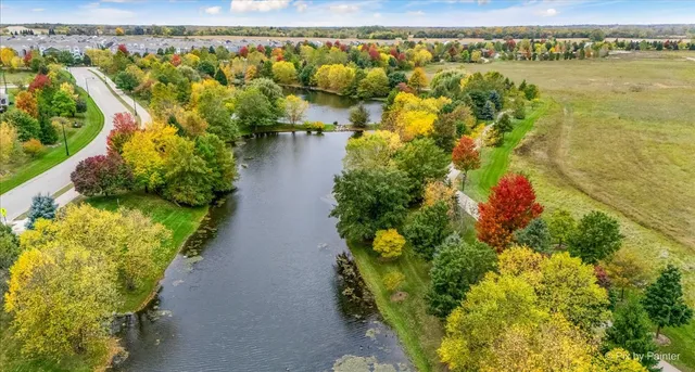 a view of a lake with a building in the background