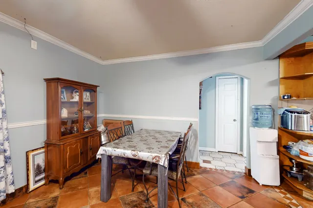 a view of a workspace with furniture and toys