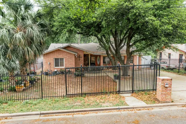 a view of a house with a small garden