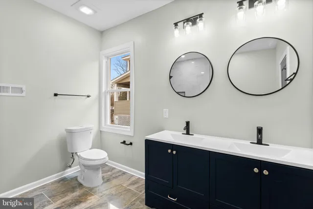 a bathroom with a sink and a toilet
