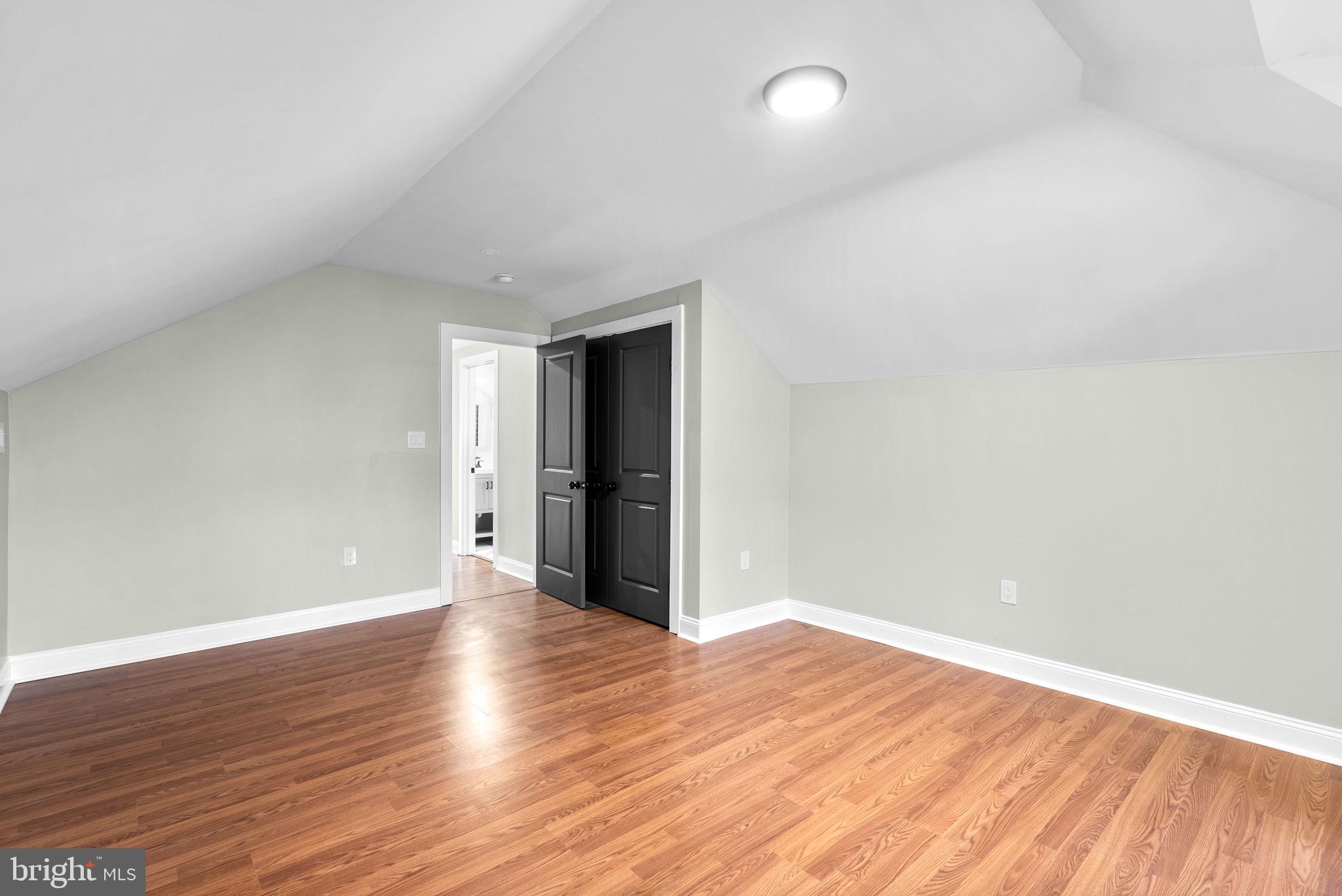4313 Wentworth Road Baltimore, MD 21207 - Photo 29 of 46 a view of an empty room with wooden floor