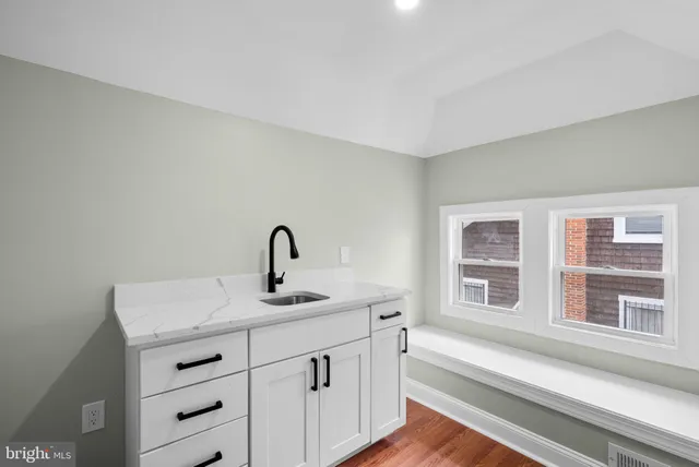 a bathroom with a sink and a toilet