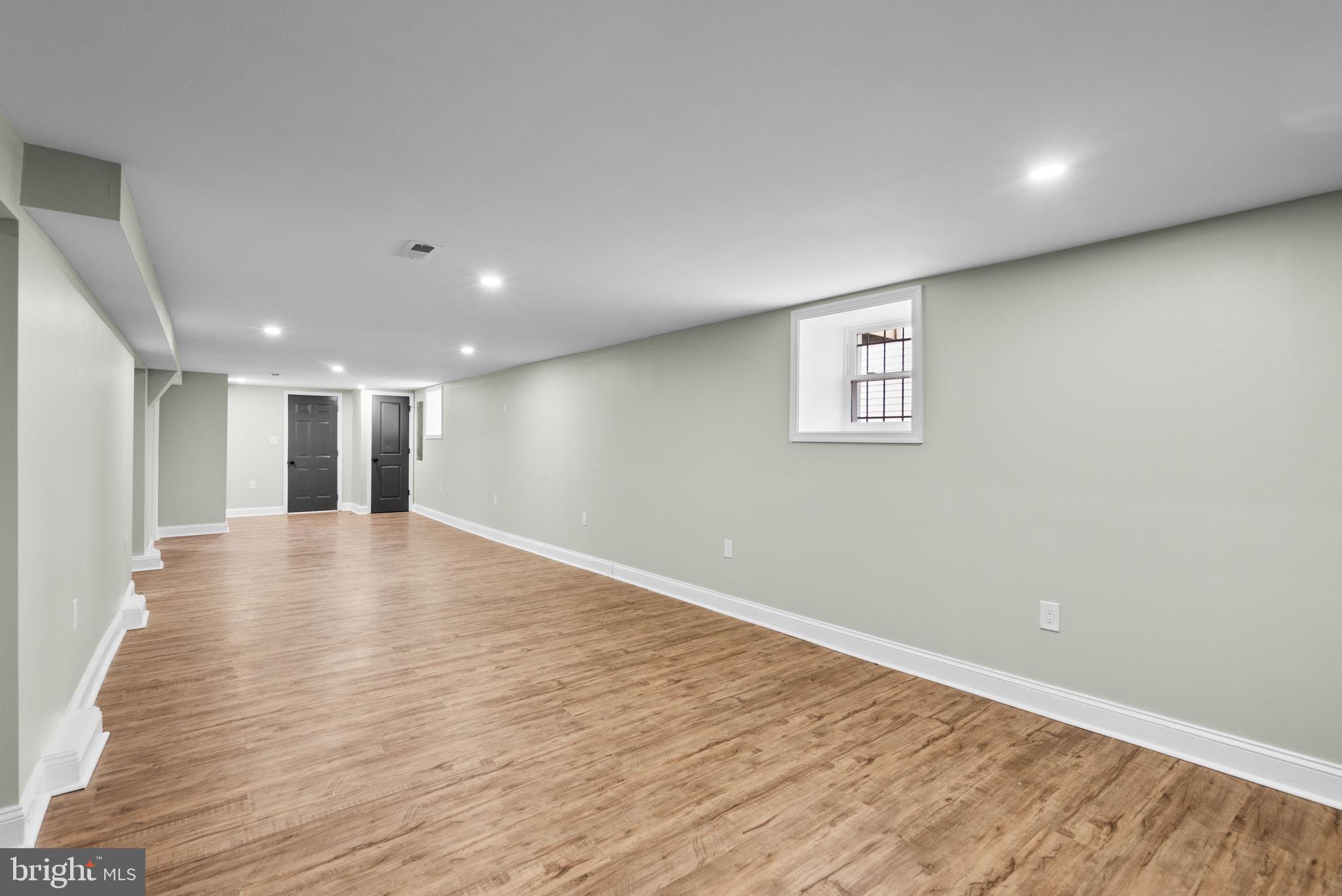4313 Wentworth Road Baltimore, MD 21207 - Photo 37 of 46 a view of empty room with wooden floor