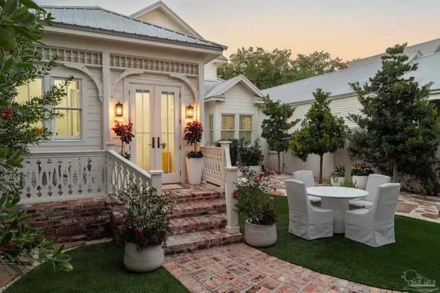 a front view of a house with a porch