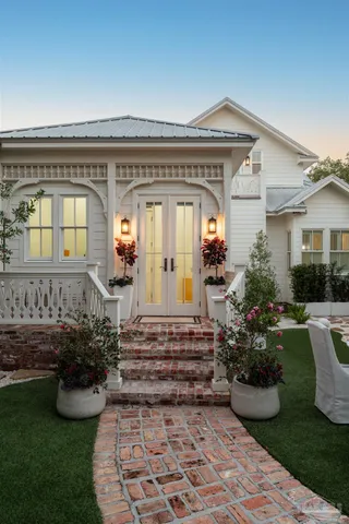 a view of a chair and table in the patio
