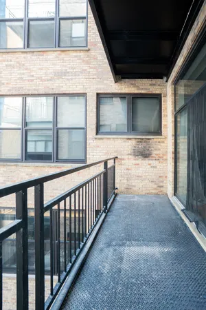 a view of a porch and a yard