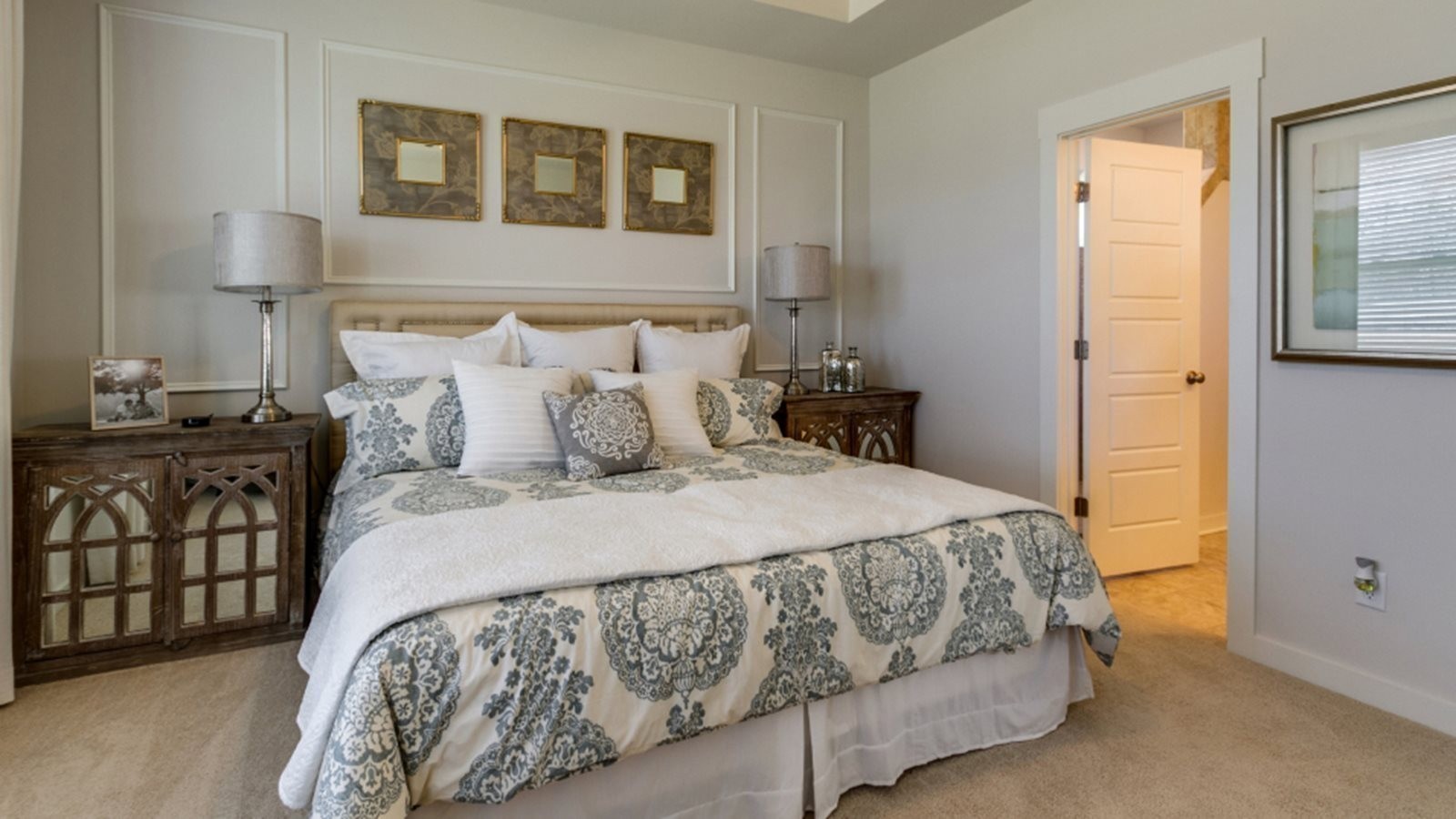 206 Goldfinch Rd Mount Mount Juliet, TN 37122 - Photo 10 of 15 a bedroom with a bed and wooden floor