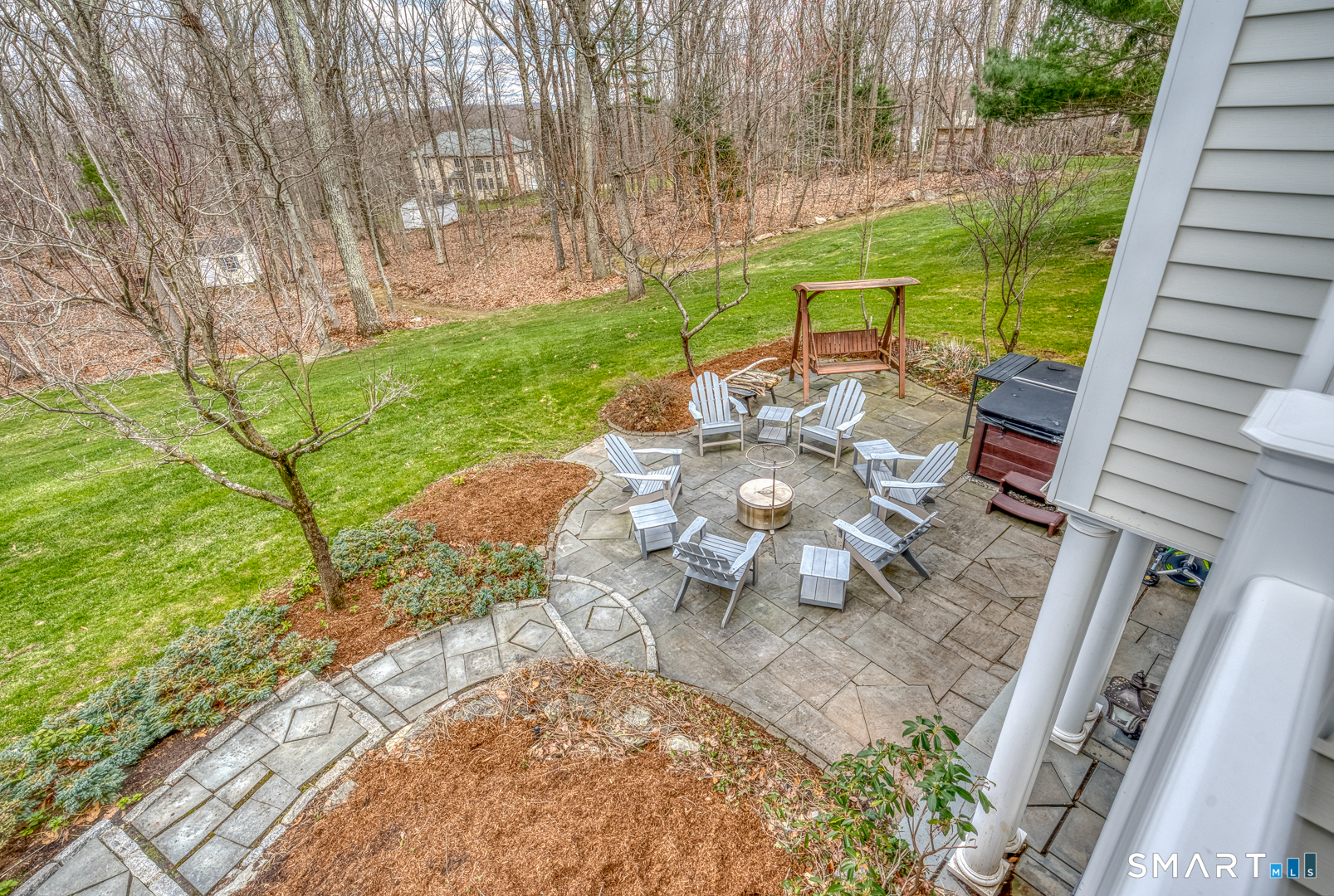 133 Feldspar Ridge Glastonbury, CT 06033 - Photo 22 of 56 a view of a backyard with sitting area