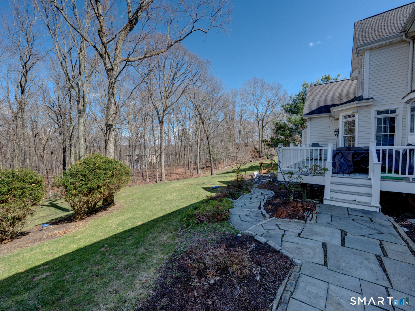 133 Feldspar Ridge Glastonbury, CT 06033 - Photo 23 of 56 a view of a patio with table and chairs potted plants and large tree